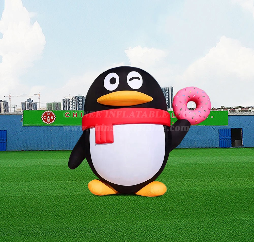 S4-627 Inflatable Cartoon Custom Animal Penguin Holding Donut